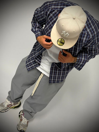 camicia a quadri blu e marrone